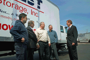 Midwest Moving & Storage execs show Ed Katz, head of IOMI®, one of several brand new, customized local office moving vans purchased to meet their ever increasing demand for service. [L-R] Marc Mendoza, Warehouse Manager; Bill Owens, Executive VP/GM; Tom Pera, Director of Sales and Marketing; Dan Bensfield, Operations Manager; and Katz.