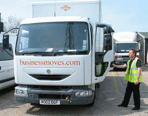 BMG's Chris Schofield conducts an on-spot inspection. The UK requires the lime-green reflective vests for transportation workers.